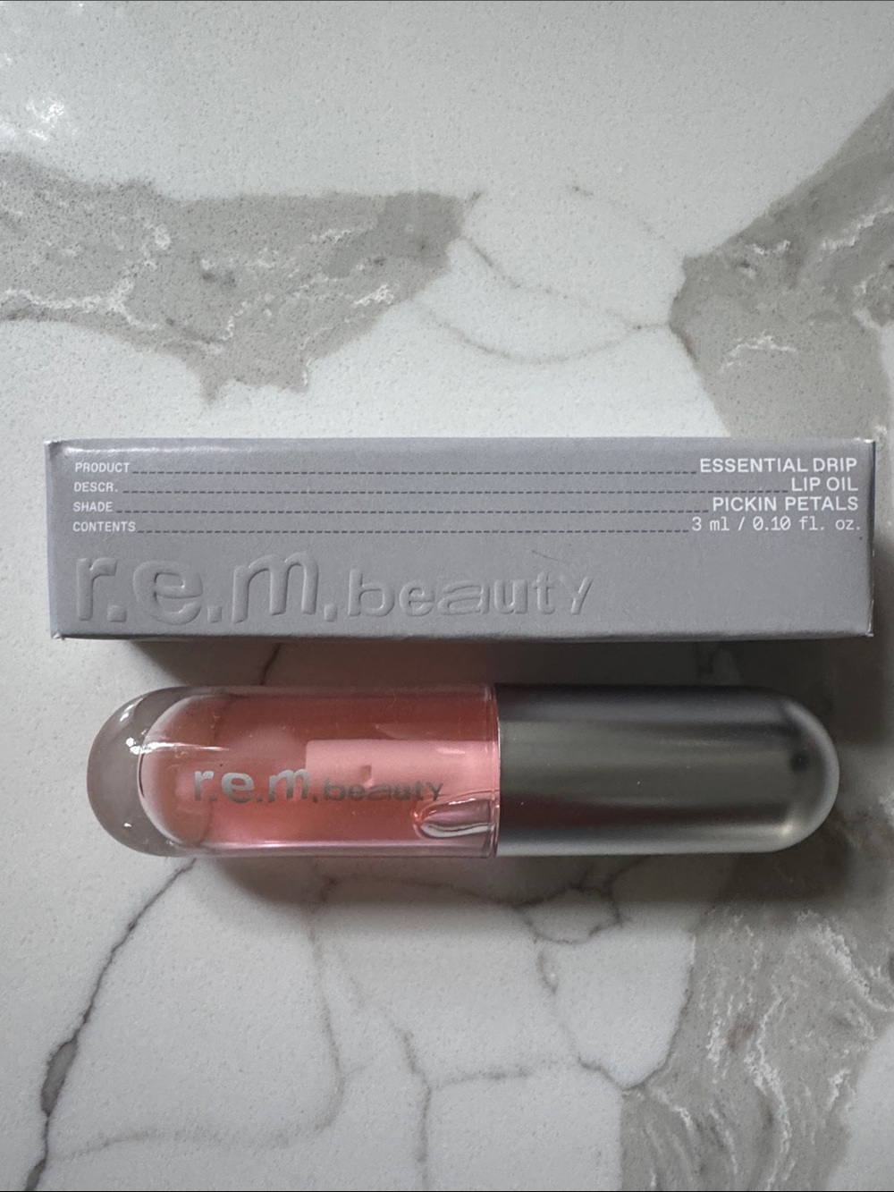 🌸5/$25🌸 REM Beauty essential drip lip oil in pickin petals